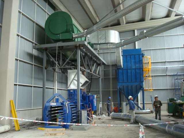 Baler, dust filtration system, fans, separator and ductwork during installation in South America.