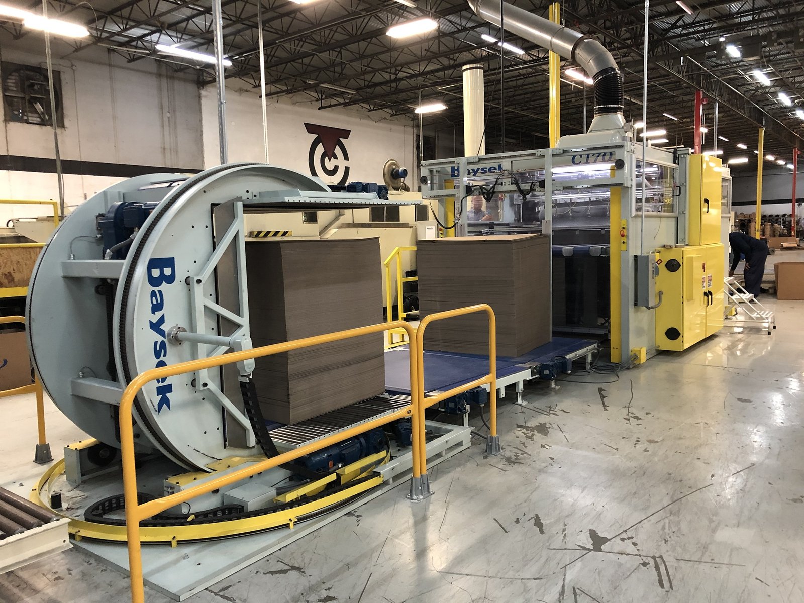 Baysek load turner in line with a die cutter