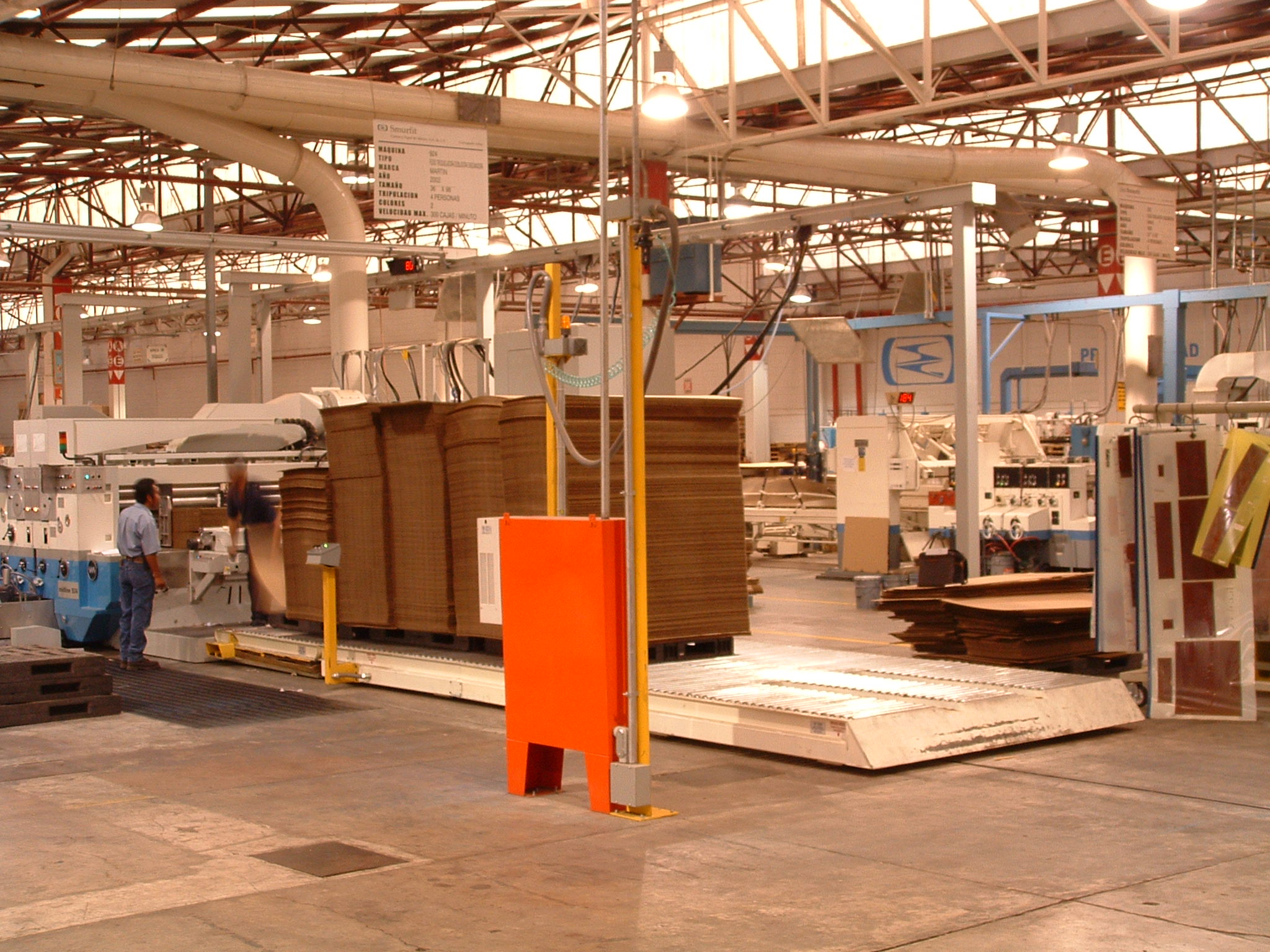 Shown is the Power Live Roller Conveyor with moveable press infeed